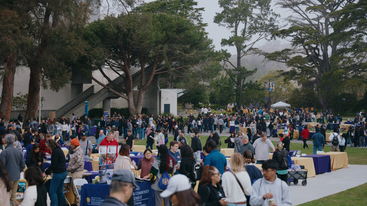 crowds observing tabling events at Discover SF event