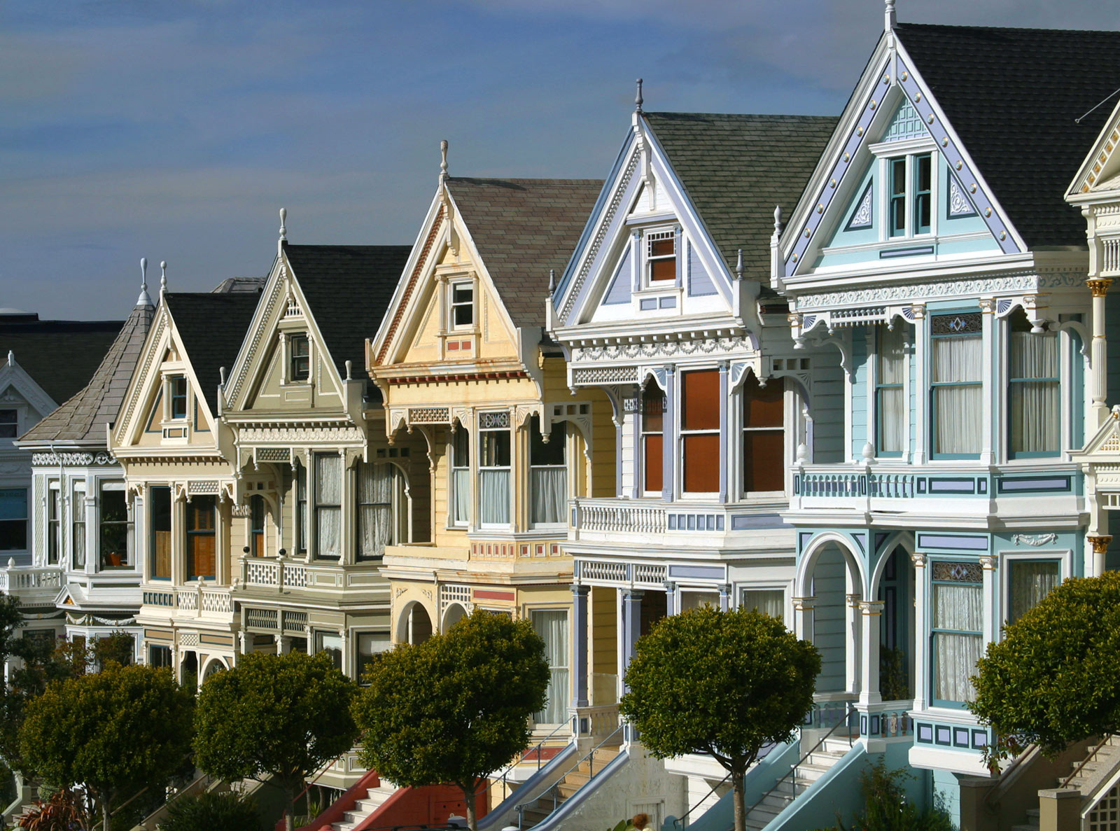 5 colored houses known as "The Painted ladies" shown in Alamo Square San Francisco.